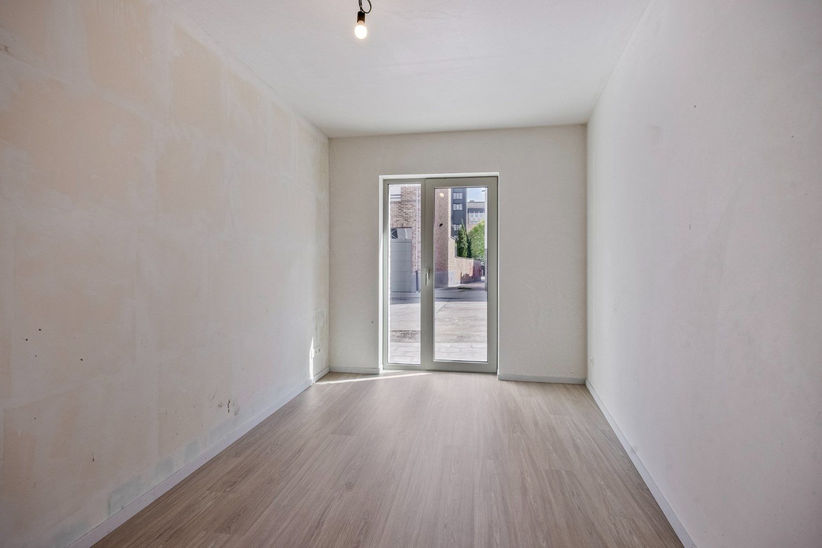 Luxueus gelijkvloers 3-slaapkamerappartement met tuin en terras! 6% BTW mogelijk  foto 24