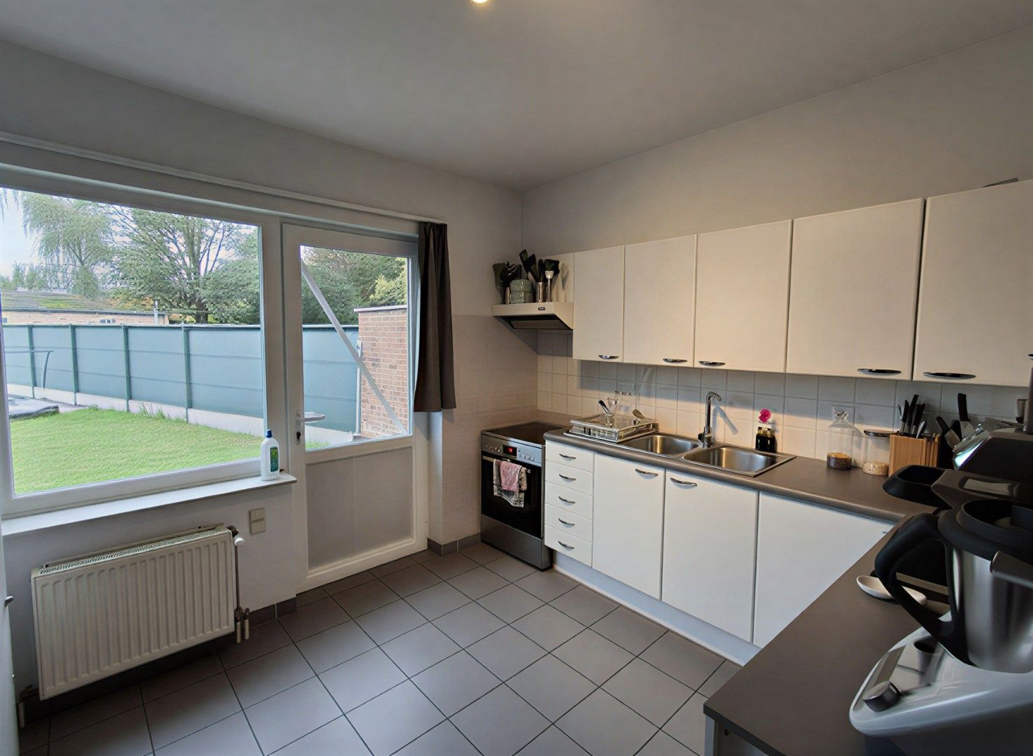 GEZELLIGE GEZINSWONING MET 3 SLPKS | GARAGE EN TUIN IN HARTJE DENTERGEM foto 4