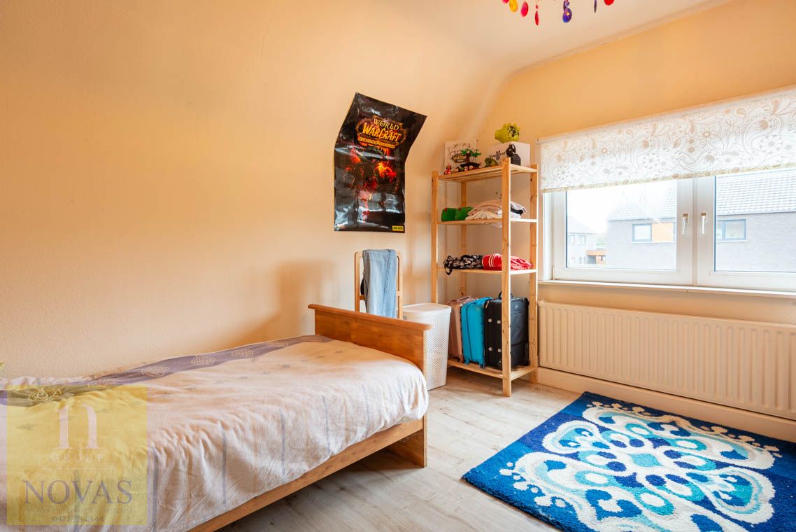 Gezellige woning met 3 slaapkamers, fijne woonkamer en diepe tuin foto 20