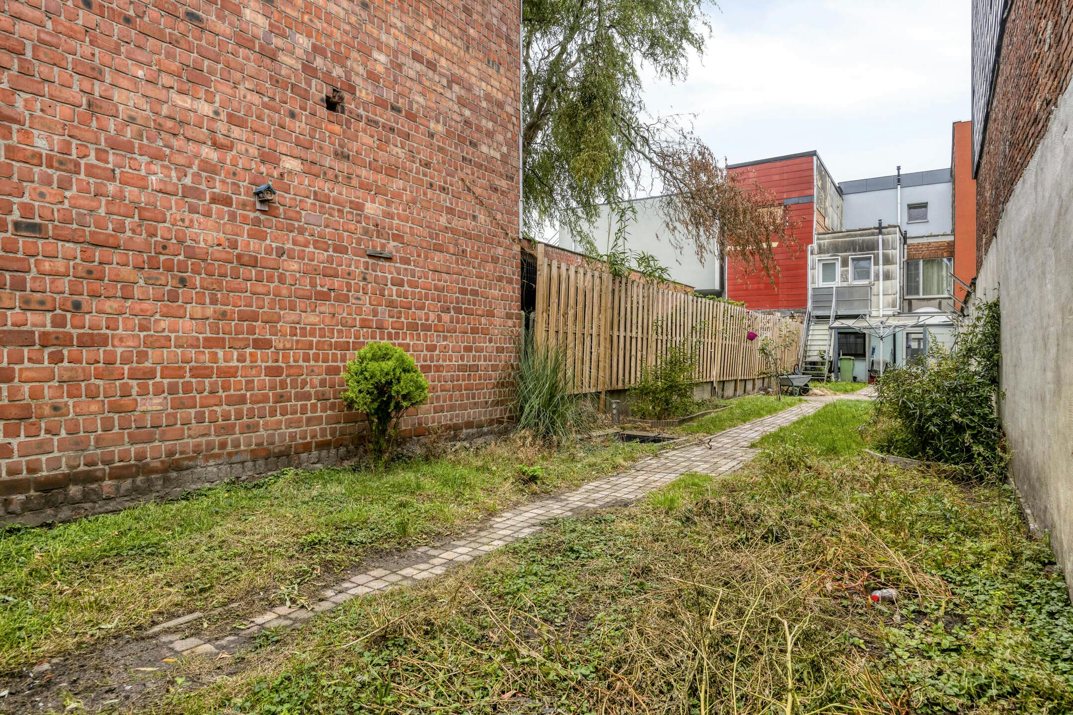 Gelijkvloersappartement met 1 slaapkamer en tuin te koop in Hoboken foto 8