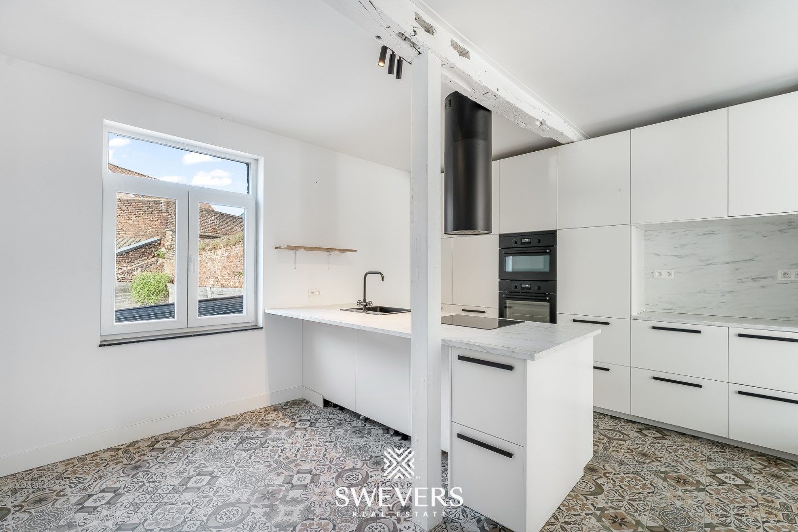 Ruim duplex appartement met knusse stadstuin in hartje Borgloon foto 12