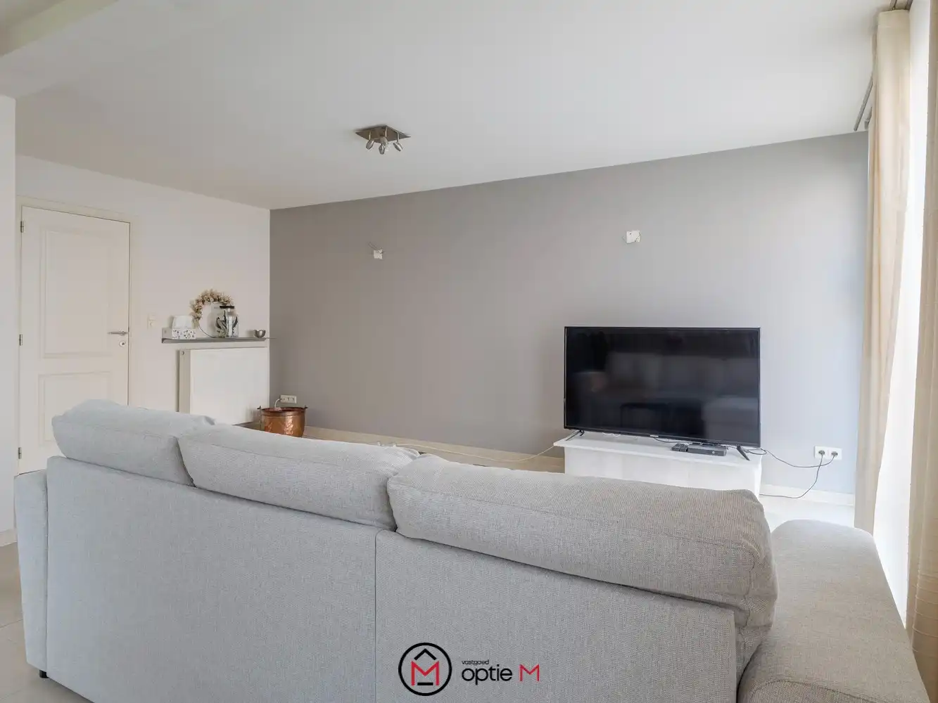 Gelijkvloers appartement te koop in Bilzen – Ruim wonen met terras, carport en kelderberging foto 7