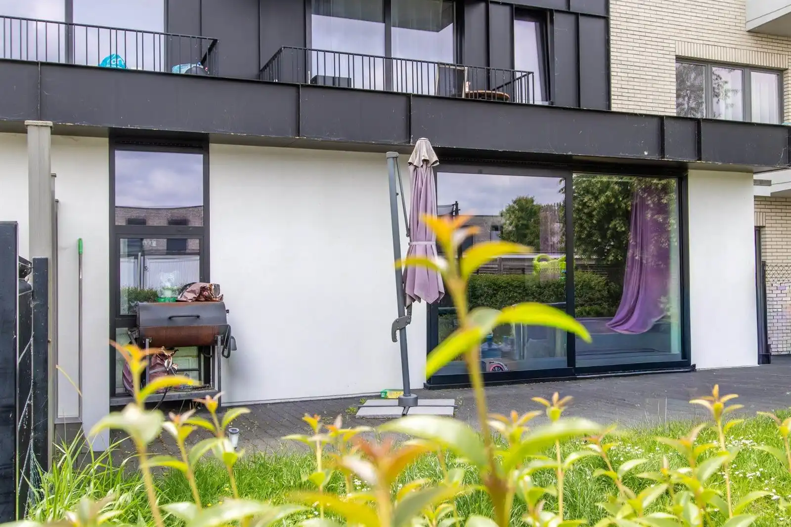 Recent appartement op gelijkvloerse verdieping met 2 slaapkamers, terras en tuin. foto 18