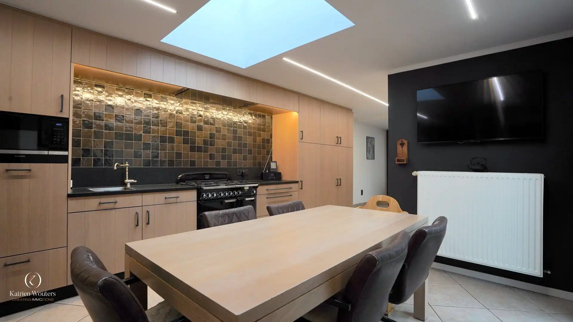 Gunstig gelegen gerenoveerde gezinswoning met tuin foto 5