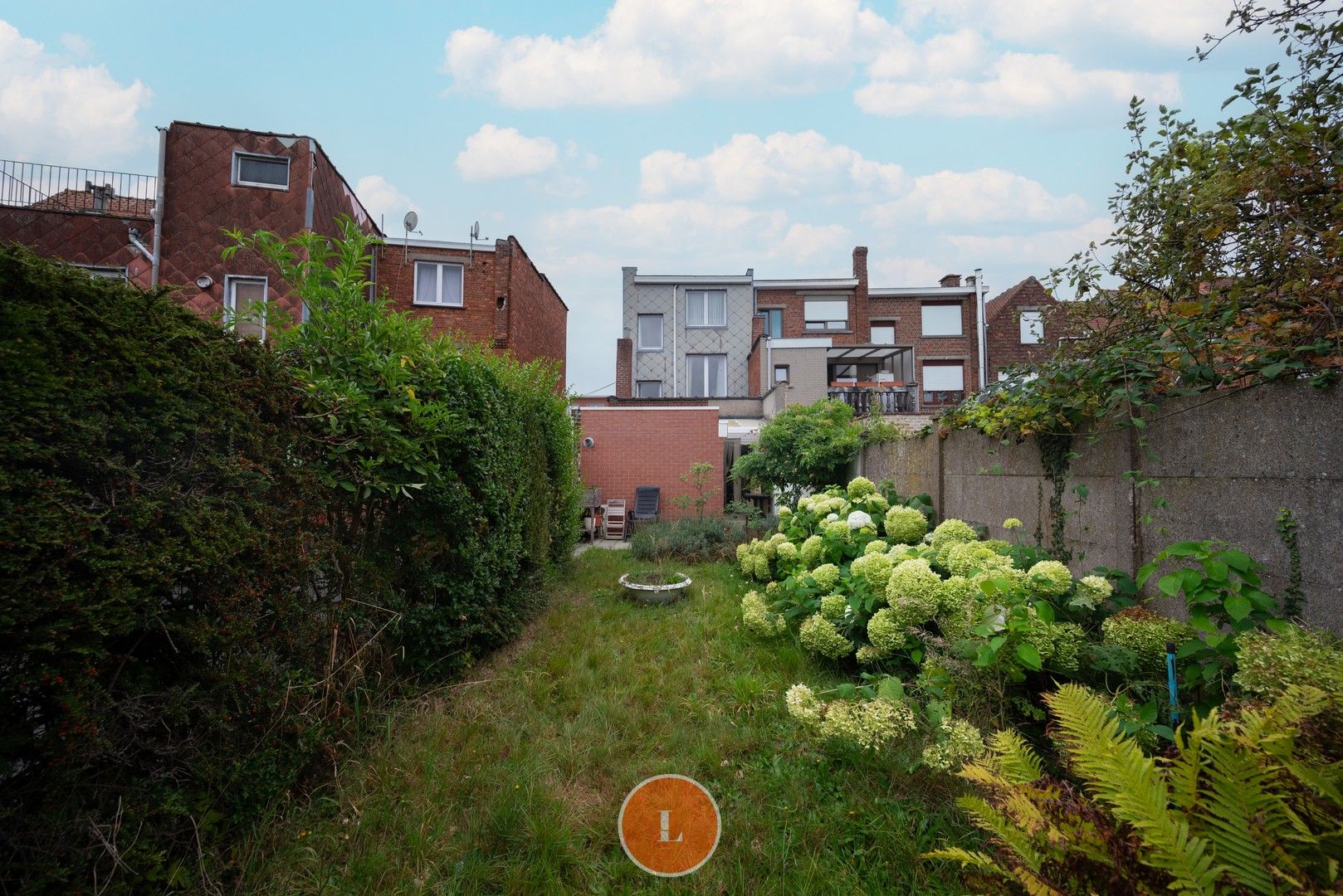 Te renoveren halfopen woning met 4 slaapkamers en tuin te Menen. foto 16