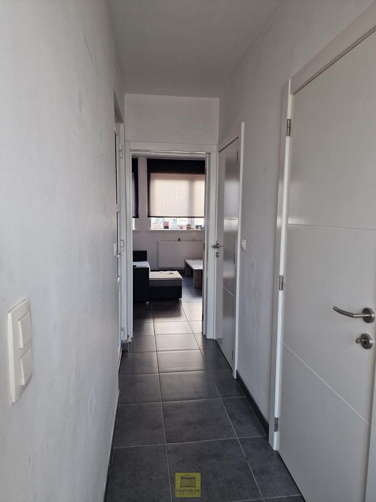 Ruim duplexappartement met aangenaam terras én garage! foto 11