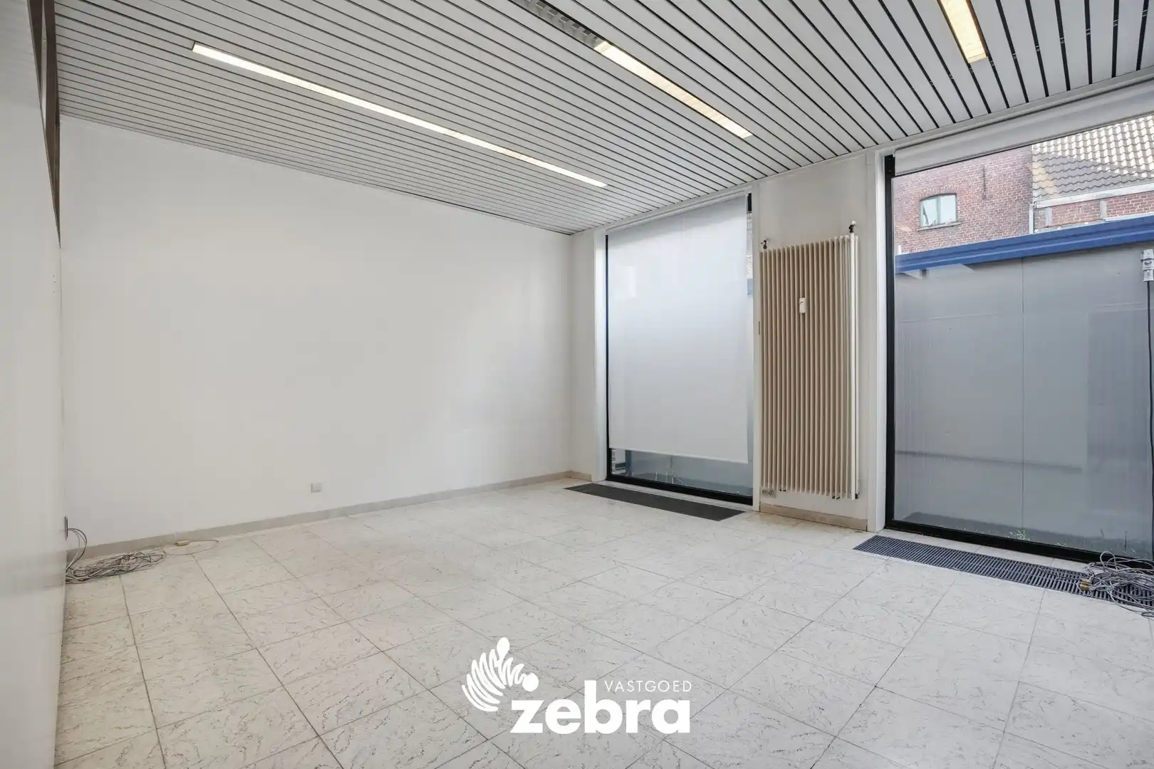 Veelzijdig handelspand met parkeerplaatsen op topligging in centrum Tielt! foto 16