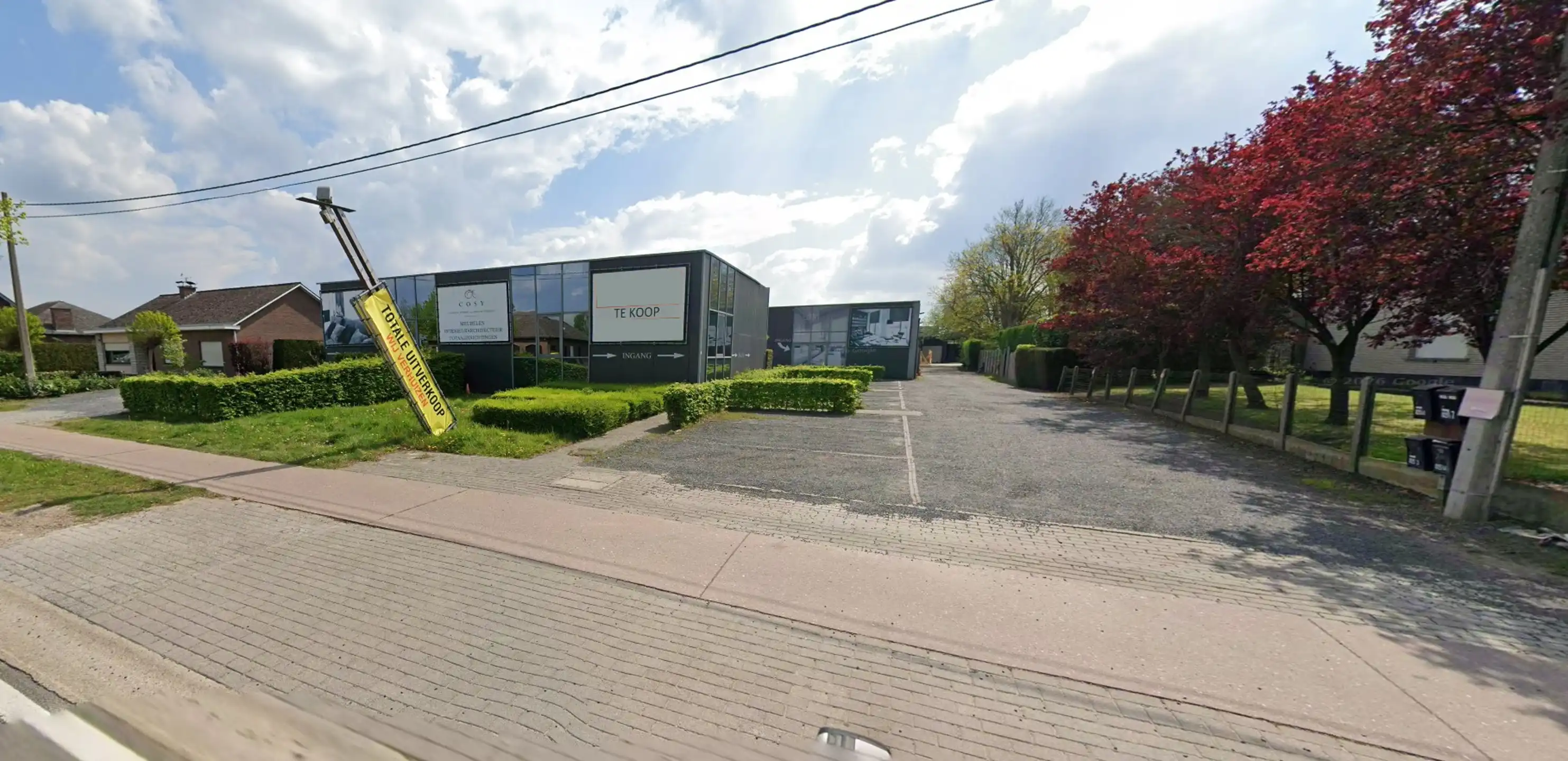 Bedrijfsgebouw te koop op commerciële ligging in Putte foto {{pictureIndex}}