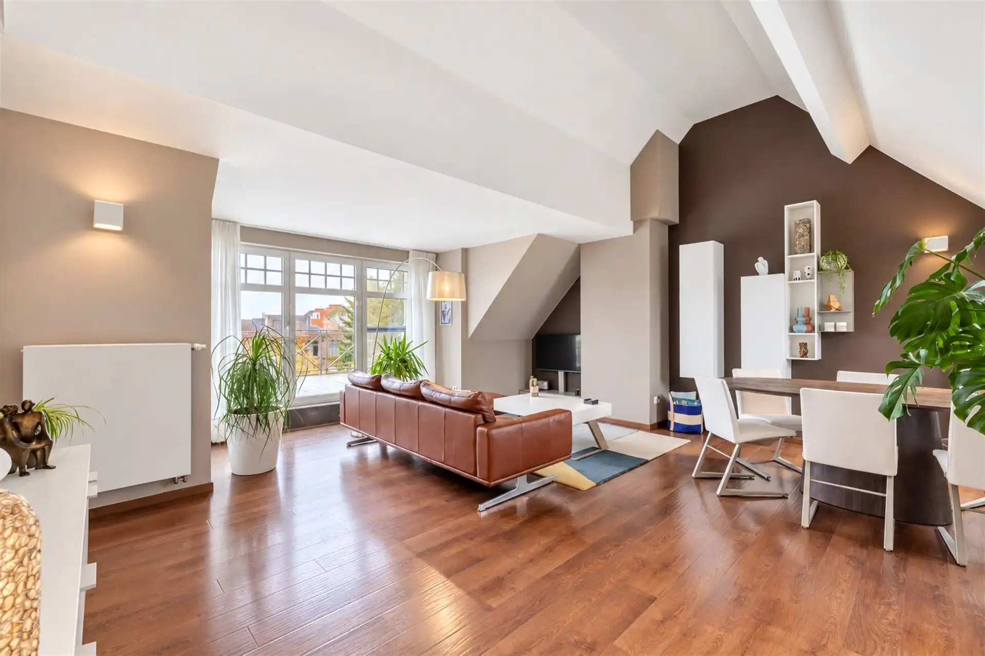 Ruim dakappartement met 50 m² zuidgericht terras + zolder foto 2