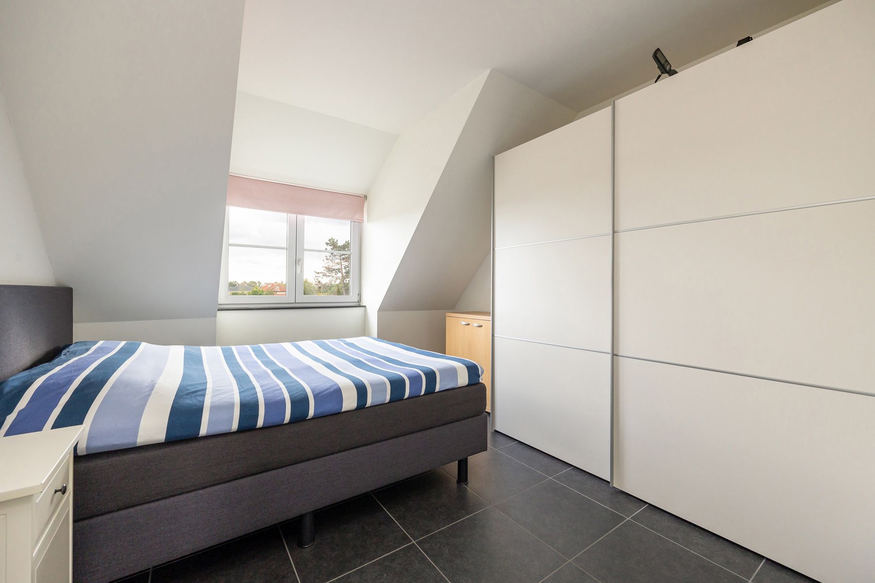 Ruim duplex-appartement (144m²) met 3 slaapkamers, 2 badkamers, 2 terrassen, zolderberging en autostaanplaats. foto 16