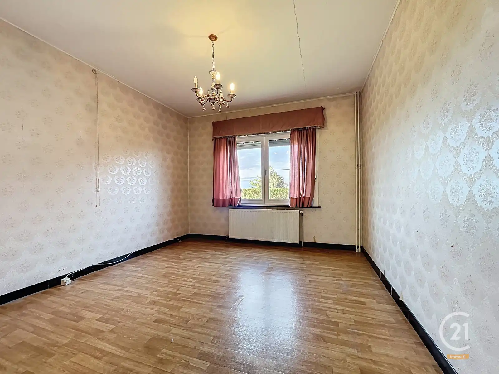 Ruime gelijkvloerse woning met 4 slpks, garage en tuin foto 13