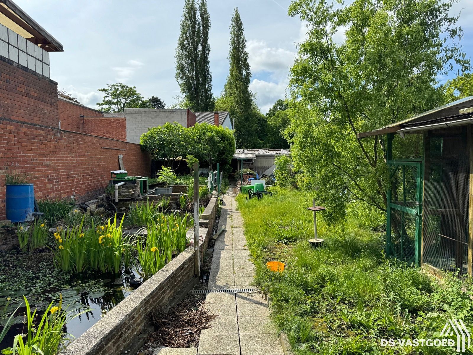 Te renoveren gezinswoning in hartje Baasrode foto 2