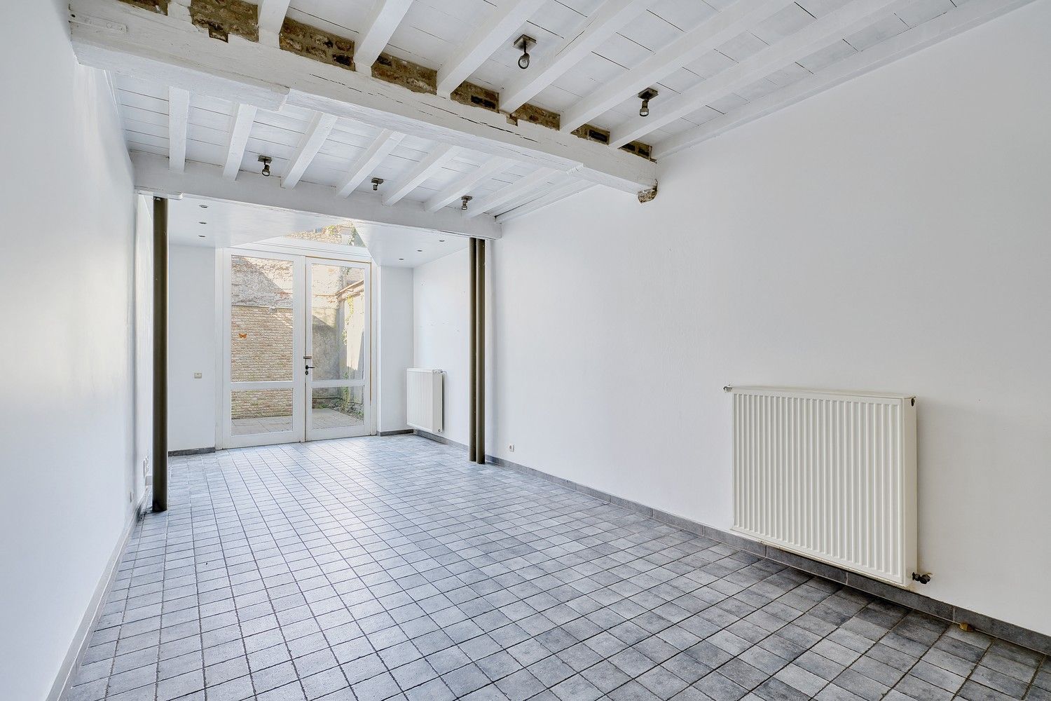 Brugge centrum Totaal gerenoveerde energiezuinige 18é eeuwse  uiterst charmante stadswoning met patio en 3 slaapkamers foto 6