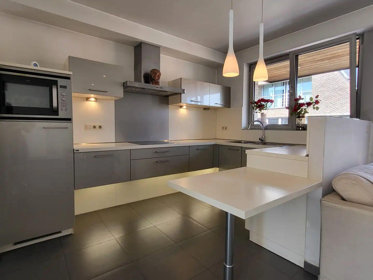 Prachtig energiezuinig 2-slaapkamerappartement met 2 zonnige terrassen en lift in hartje Geraardsbergen. foto 19