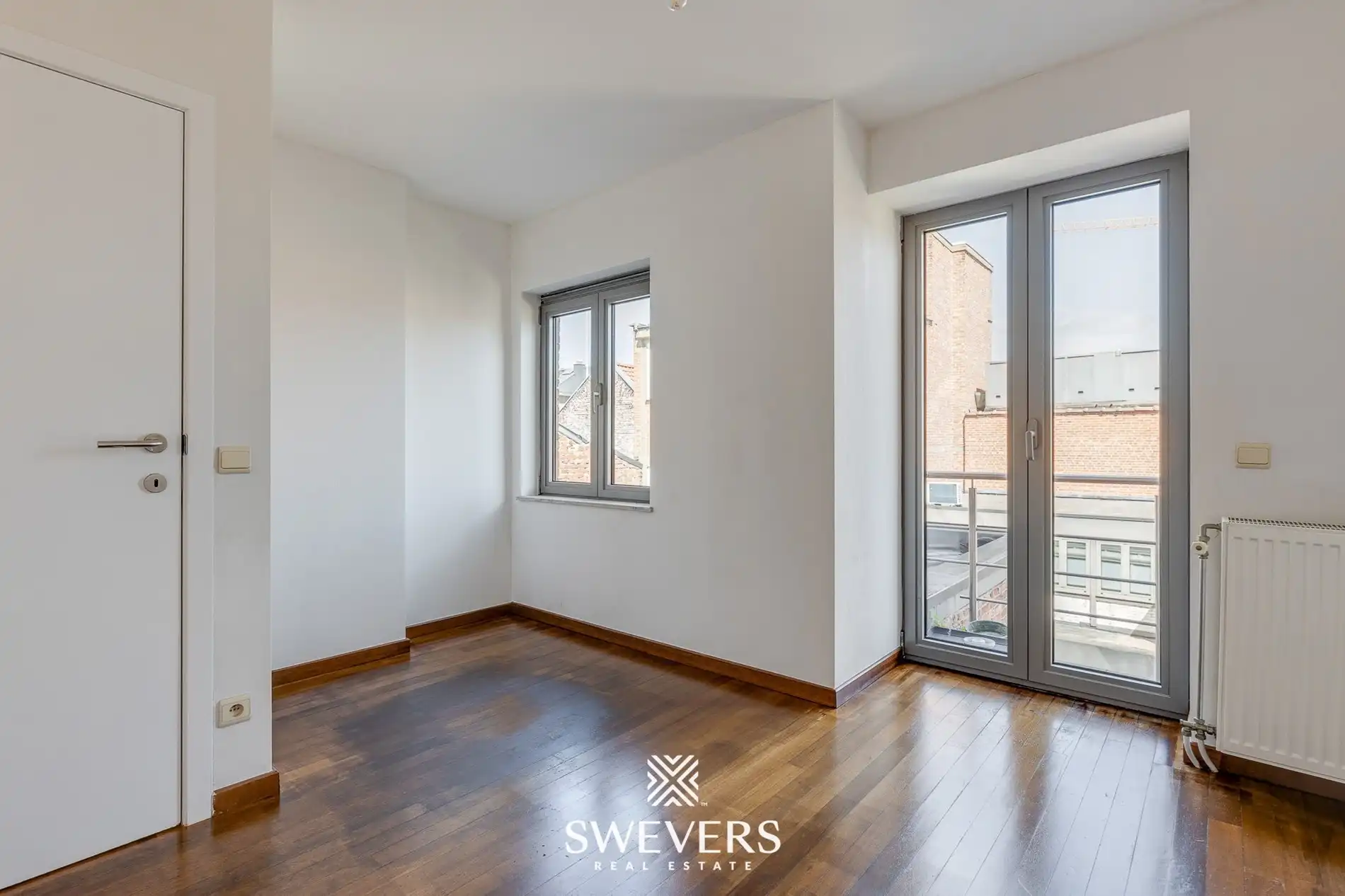 Ruim duplex-appartement in hartje Hasselt: ideaal voor 3 studenten of om te co-housen foto 7
