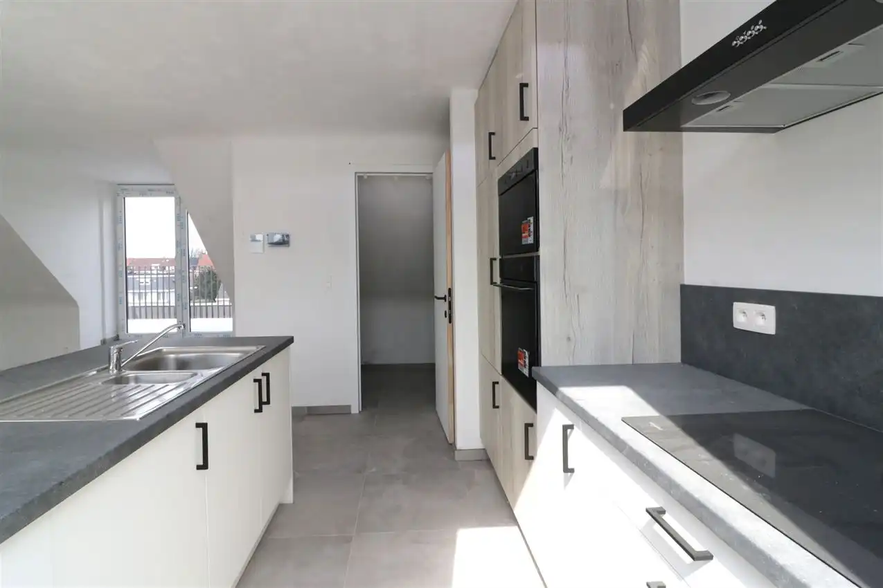 Uniek penthouse in centrum Aarschot met 1 slpk. parking en terras foto 17