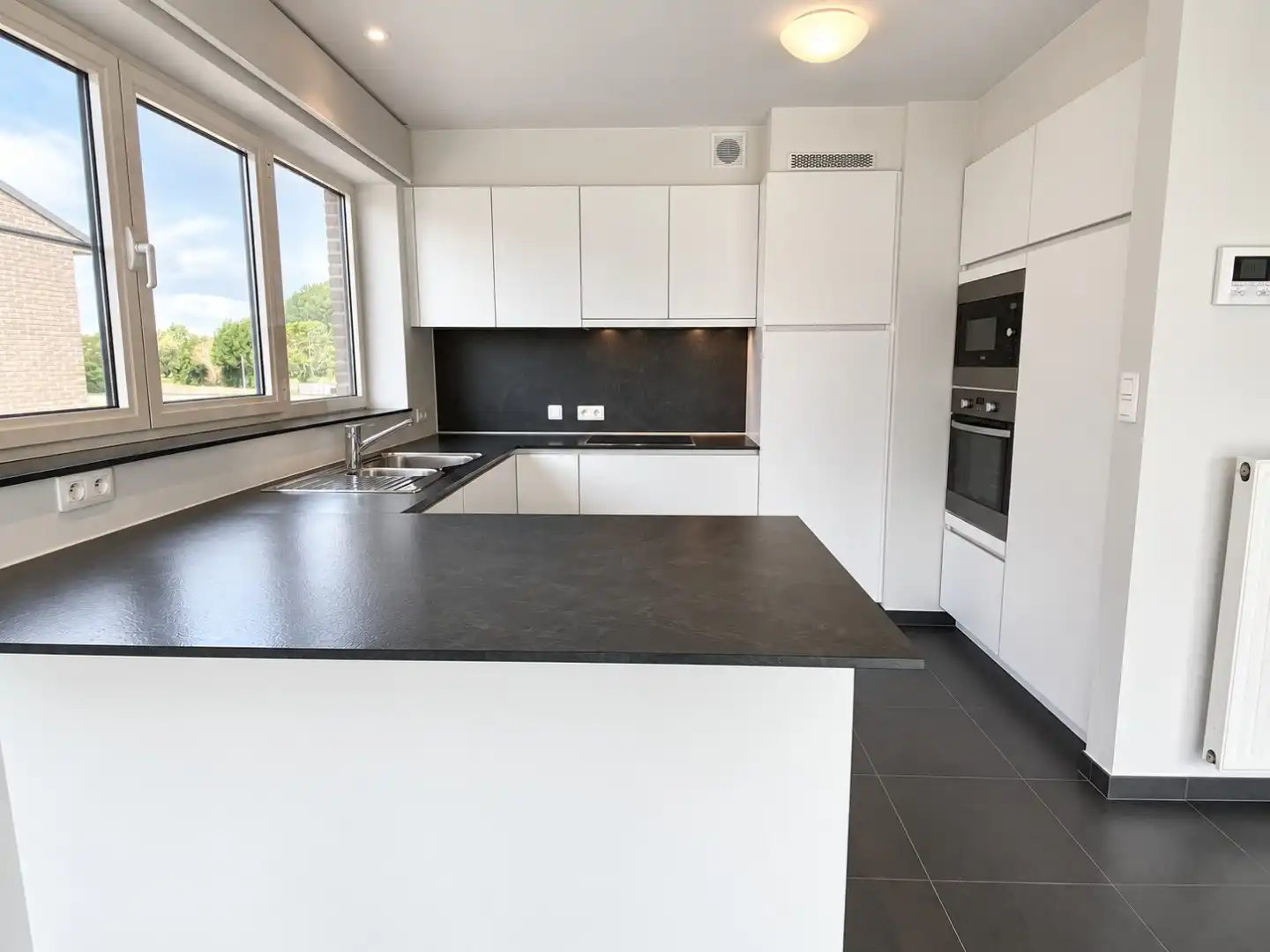 Energiezuinig appartement met twee slaapkamers te huur in Evergem foto 7