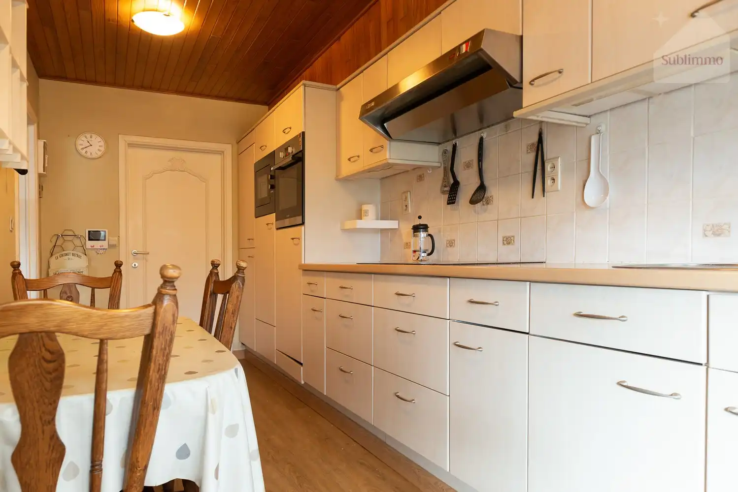 Opbrengsteigendom met 2 appartementen, tuin en garages te koop in Mol centrum foto 9