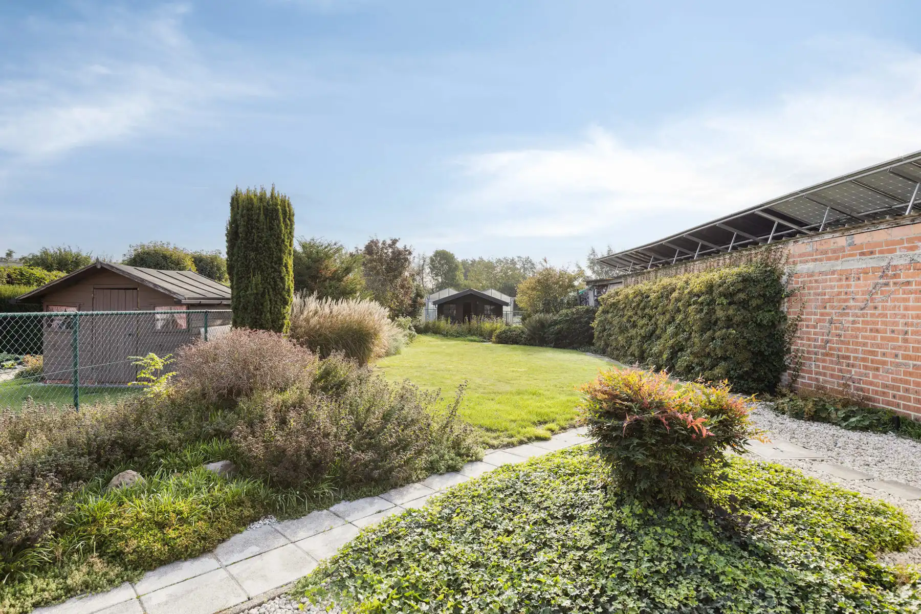 Solide halfopen bebouwing met 3 slaapkamers en garage foto 28