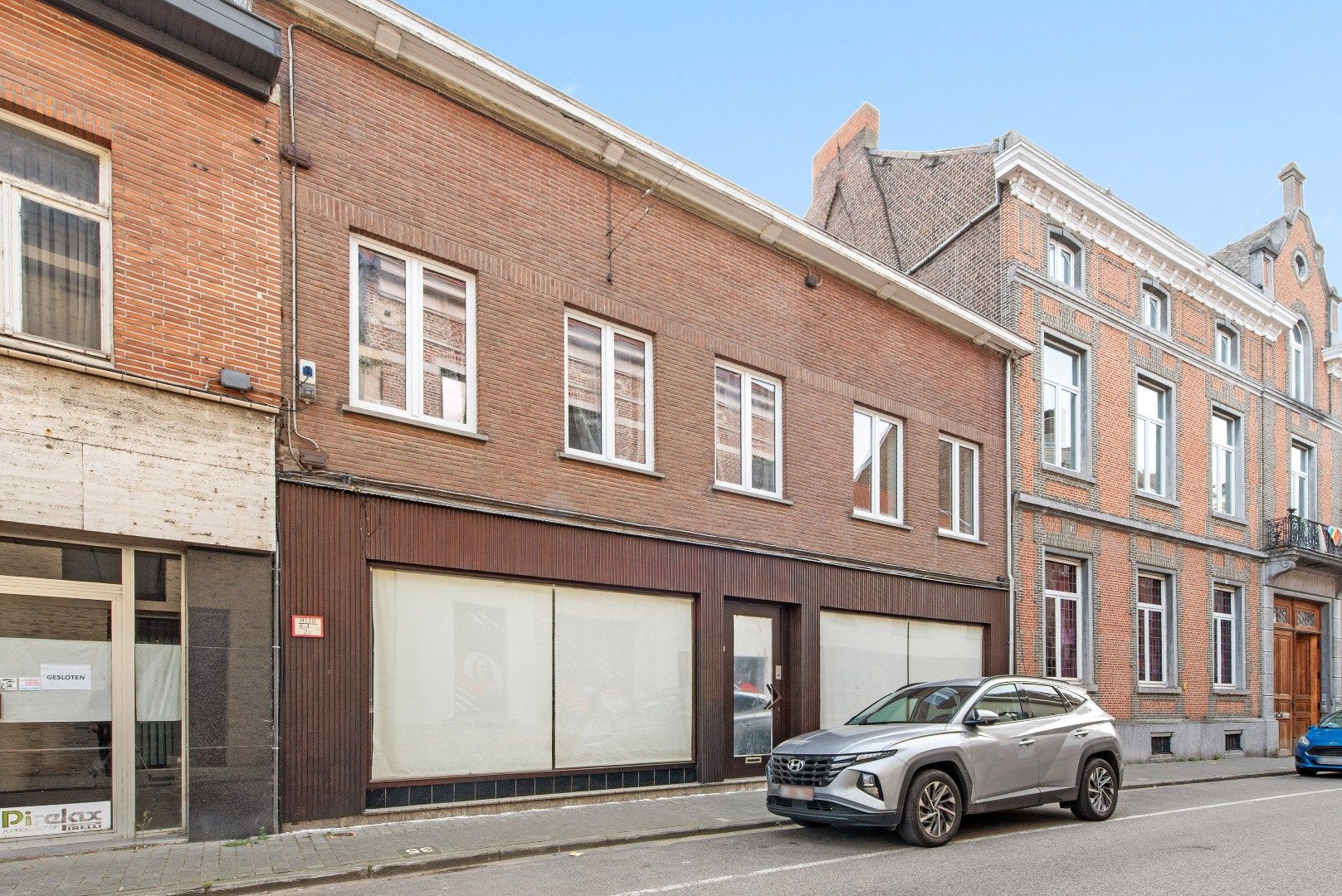 Polyvalente rijwoning met grote handelsruimte te Tienen foto 2