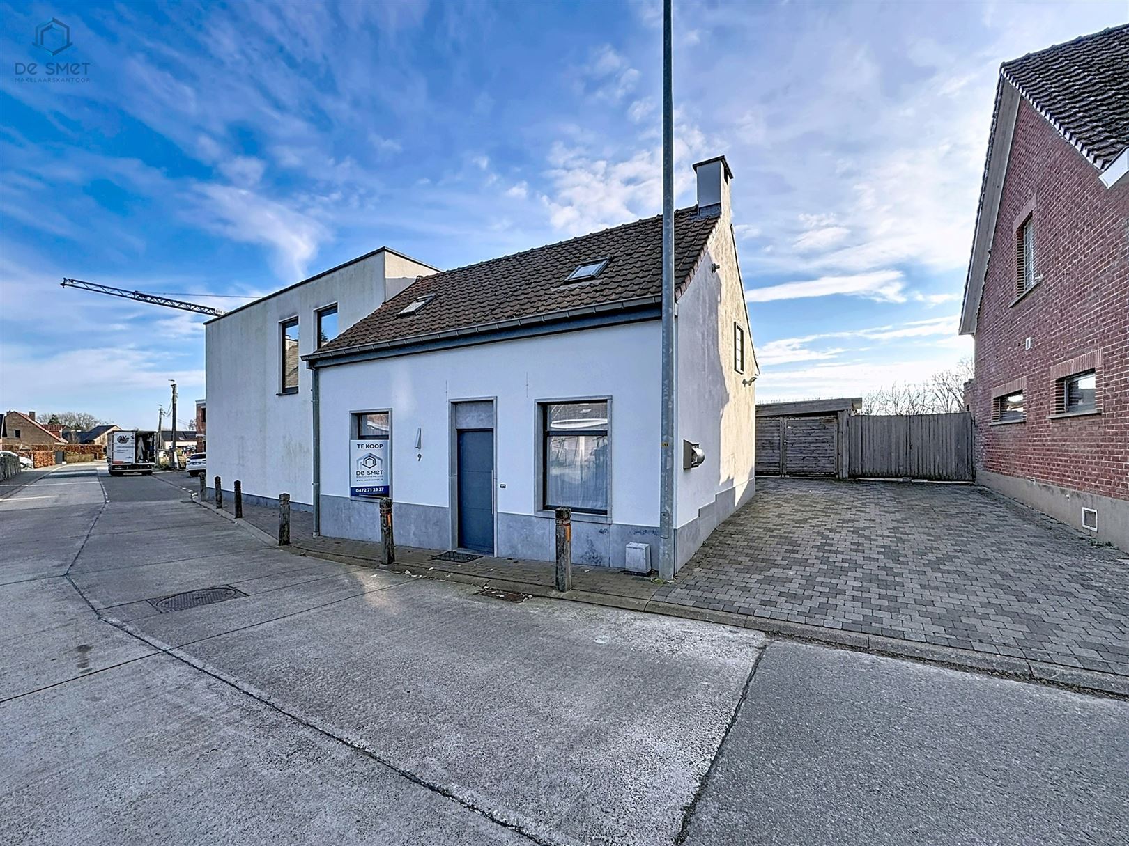 Hoofdfoto van de publicatie: Instapklare woning met 2 slaapkamers, terras, carport en berging in Ophasselt