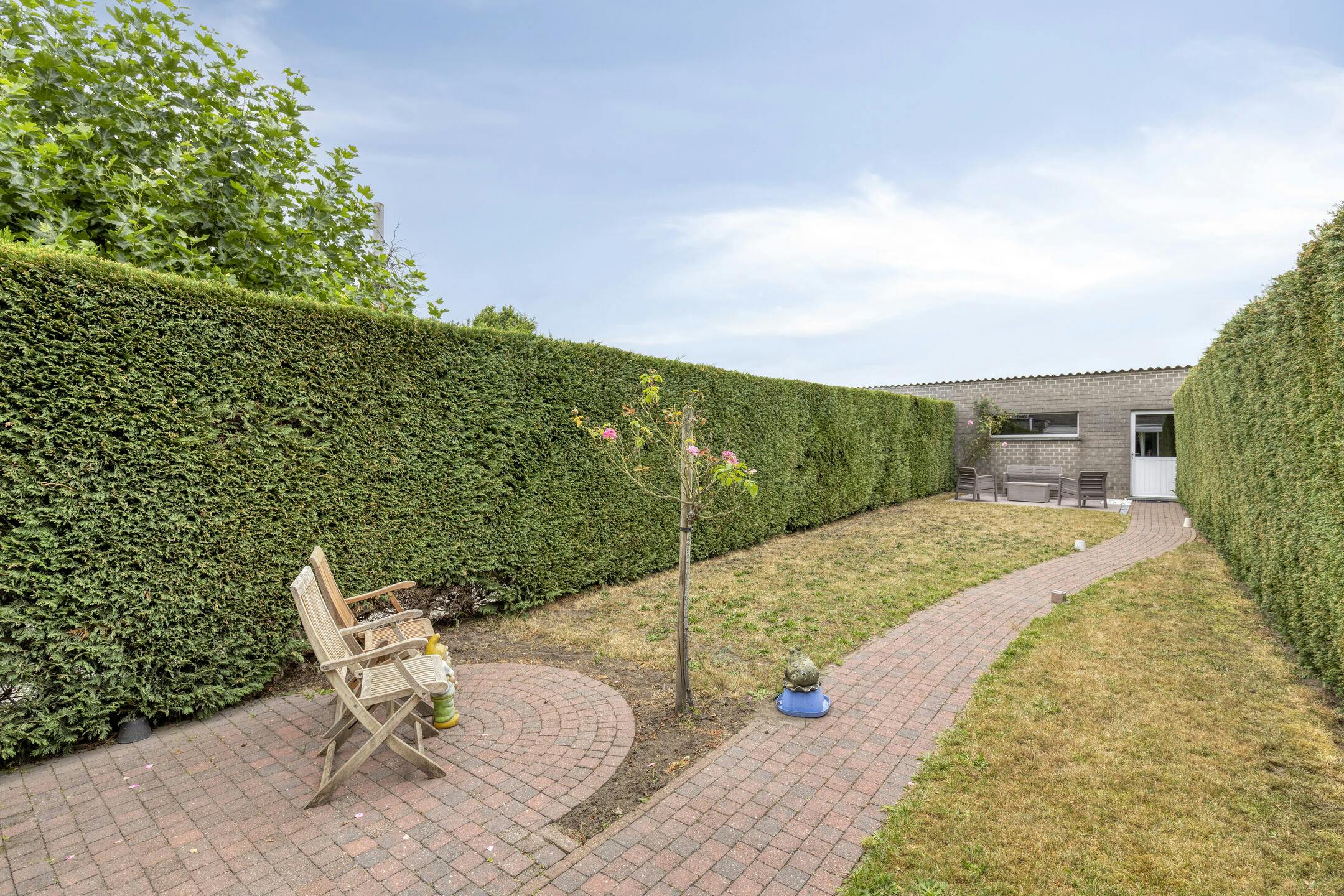 Knusse woning met dubbele garage en uitweg achteraan te Gavere foto 21