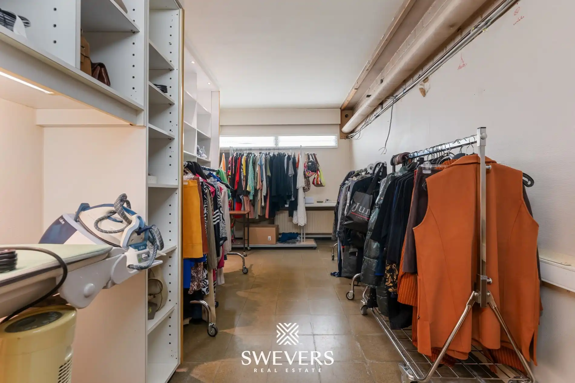 Opbrengsteigendom met handelspand, ruim appartement en uitbreidingspotentieel in hartje Heusden-Zolder foto 11