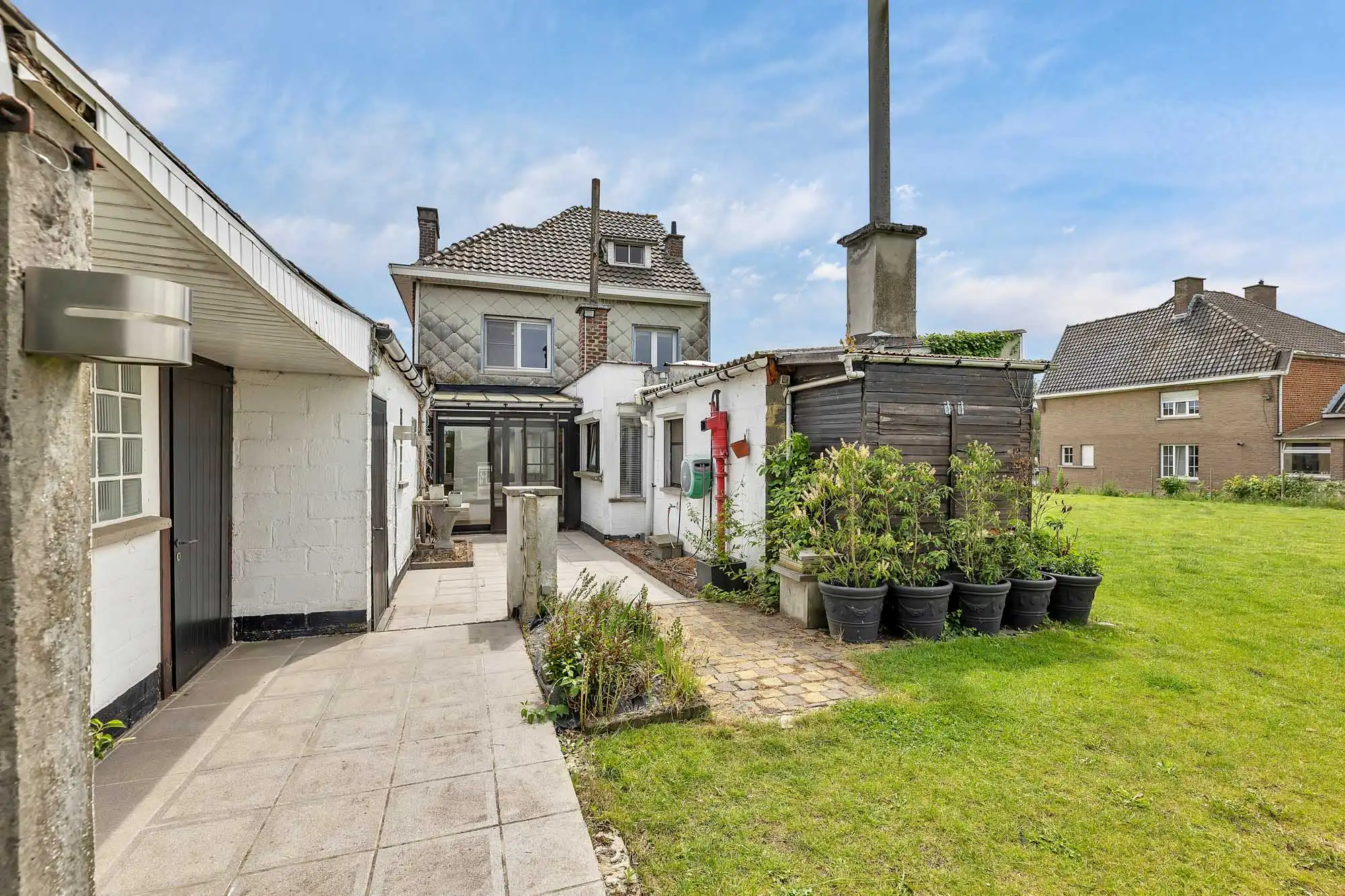 Goed onderhouden woning met garage en tuin foto 28