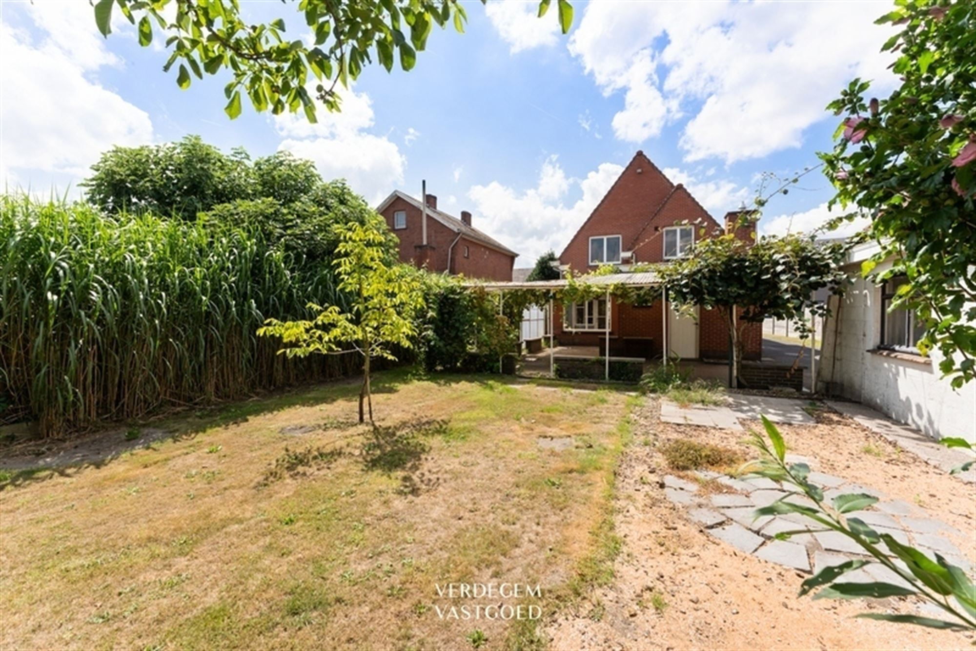 Karaktervolle woning met jaren '50 charme, 3 slaapkamers, garage en gezellige tuin foto 19