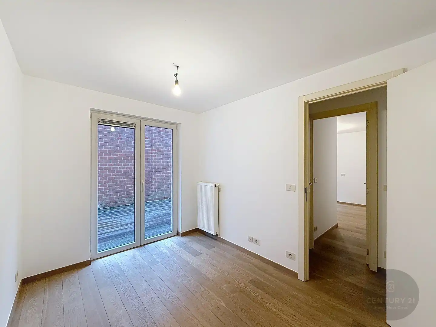 2 slaapkamer appartement met koer en garagestaanplaats foto 8