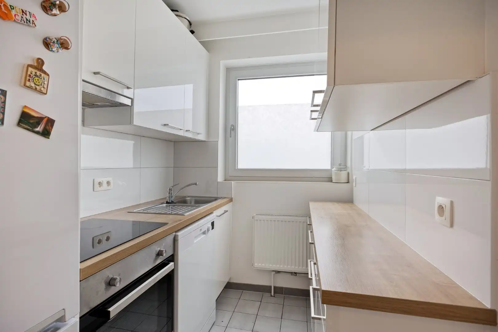 Verzorgd appartement met lift, 2 slaapkamers, garage en kelder foto 8