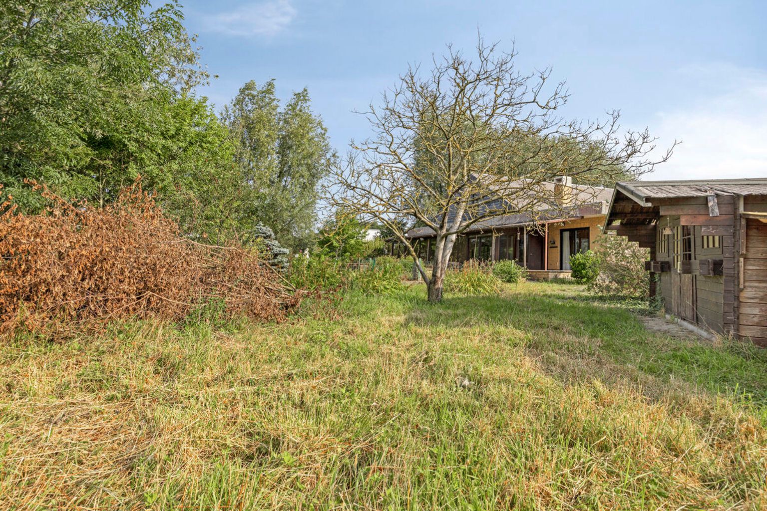 Te renoveren laagbouwvilla met verzicht in rustige straat foto 33