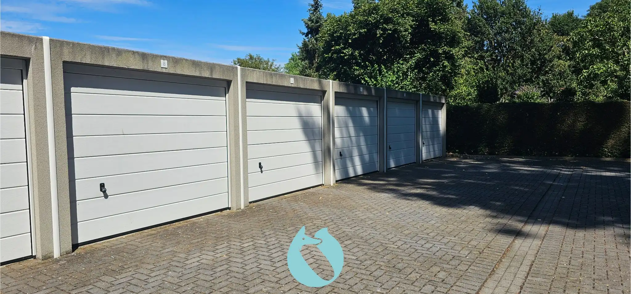 9 verhuurde garages en 3 autostaanplaatsen foto 3