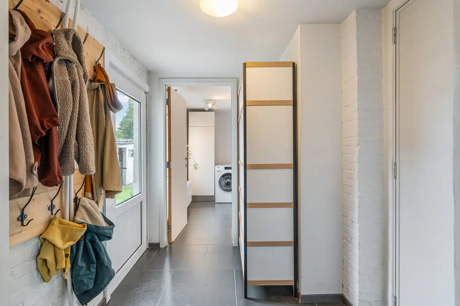 Goed gelegen, vrijstaande en lichtrijke woning met een oprit met een garage, 3 slaapkamers en een diepe tuin te Wilsele! foto 9