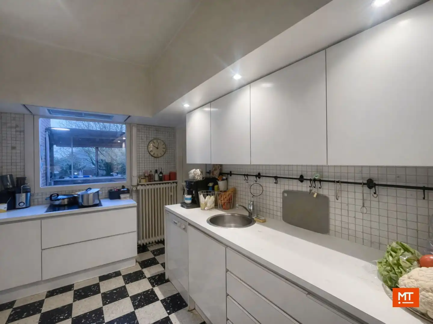 Alleenstaande woning met 3 slaapkamers (4 mogelijk), garage en tuin (ZW) te koop in Langemark foto 6