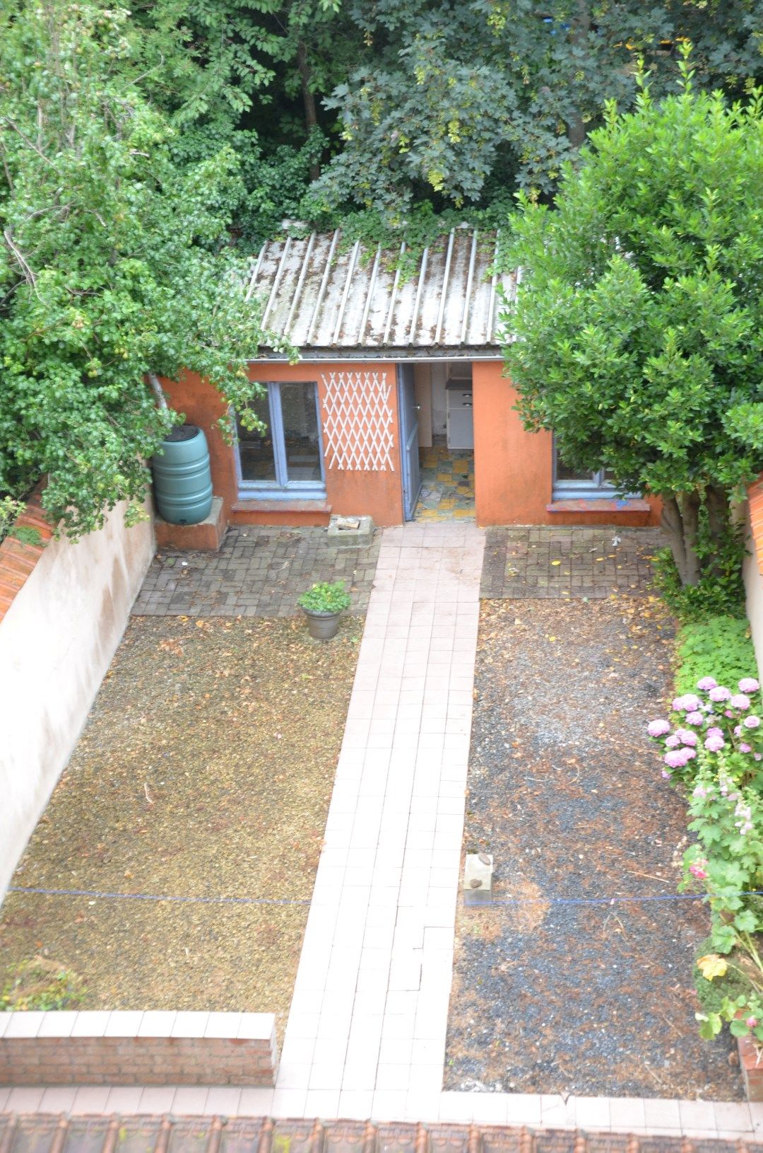 Te renoveren karaktervolle ruime woning met zonnige tuin foto 16