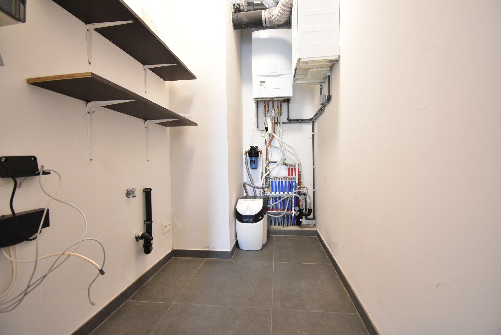 Aantrekkelijk recent gelijkvloers appartement, met 1 slaapkamer, ruim terras, privétuin en standplaats in centrum van Beverst.  foto 15