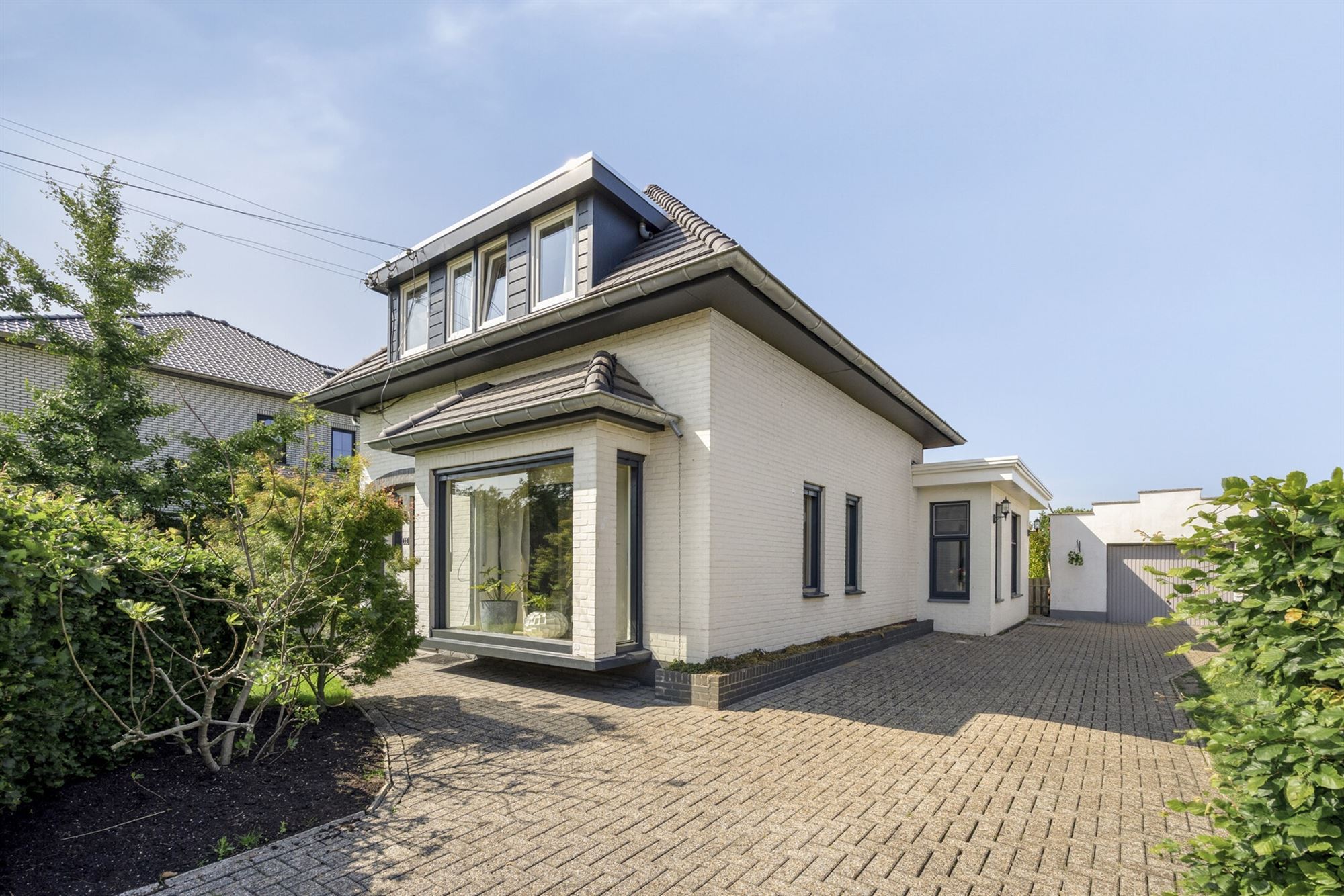 Verassend royale gezinswoning met 4 a 5 slaapkamers foto 5