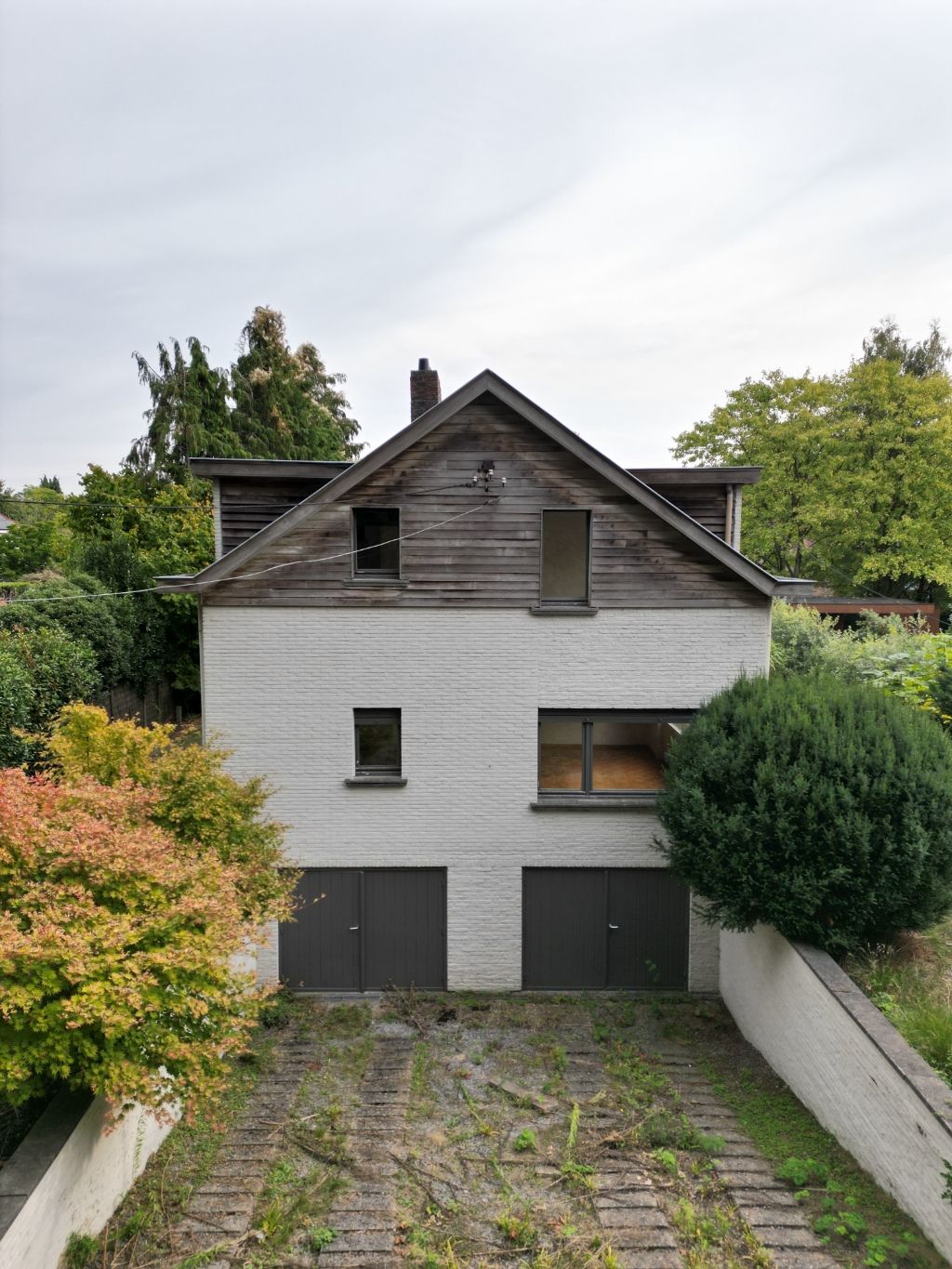 Bijzondere opportuniteit! Opbrengsteigendom bestaande uit twee te renoveren of herop te bouwen appartement foto 4