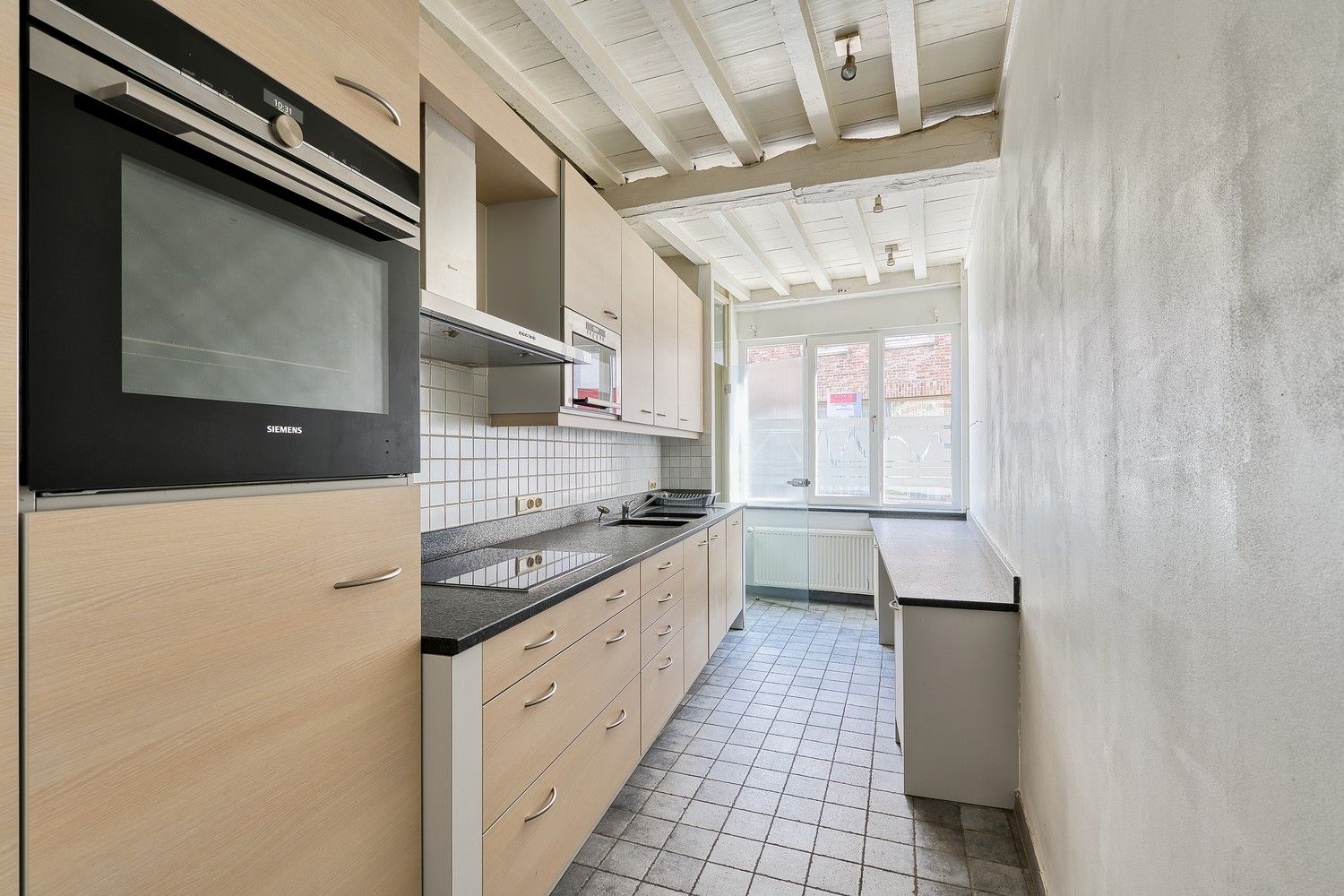 Brugge centrum Totaal gerenoveerde energiezuinige 18é eeuwse  uiterst charmante stadswoning met patio en 3 slaapkamers foto 5
