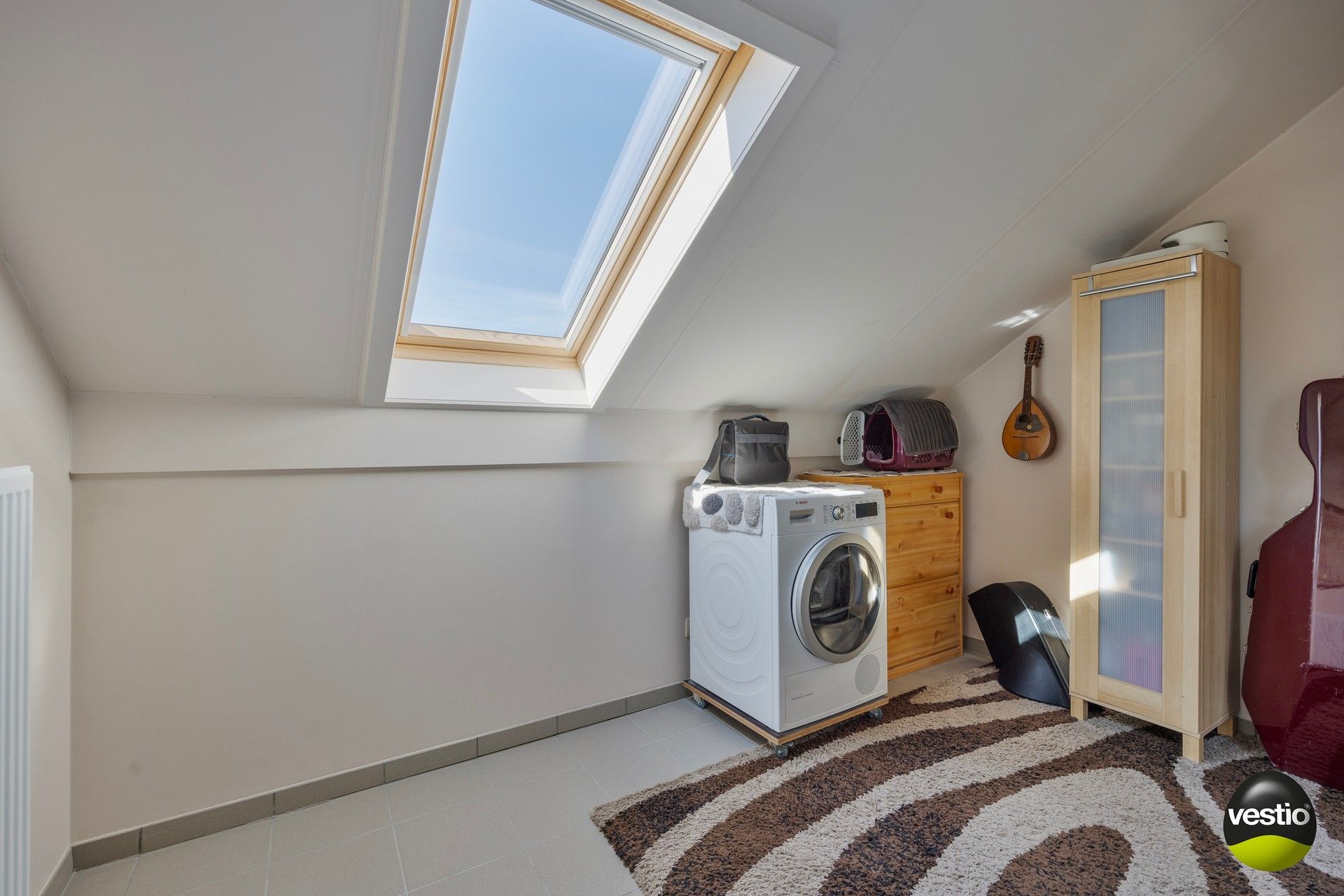 Tof, instapklaar dakappartement met 2 slaapkamers, zonneterras en parking! foto 12