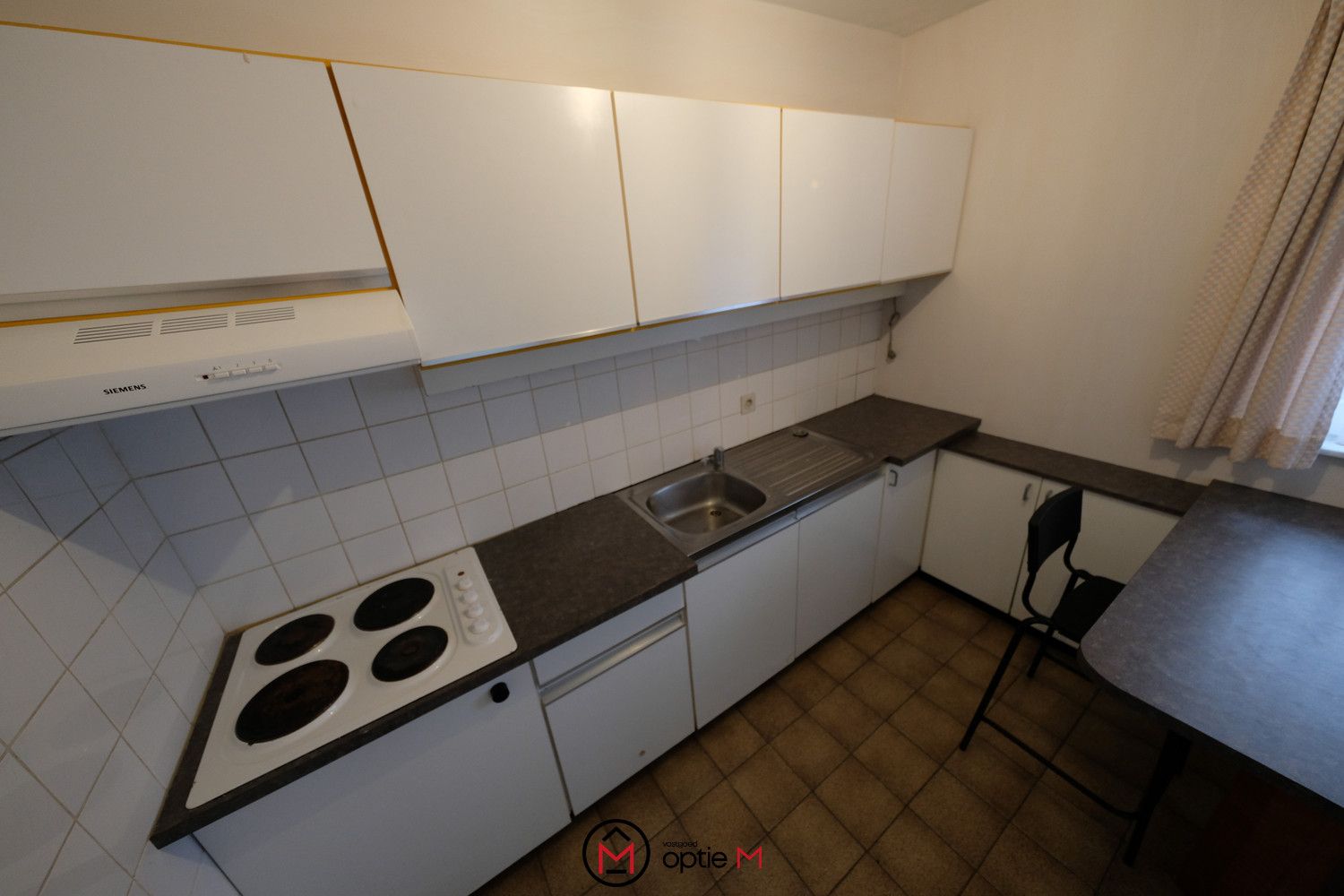 Ruim gelijkvloers appartement met drie slaapkamers in Bilzen foto 3