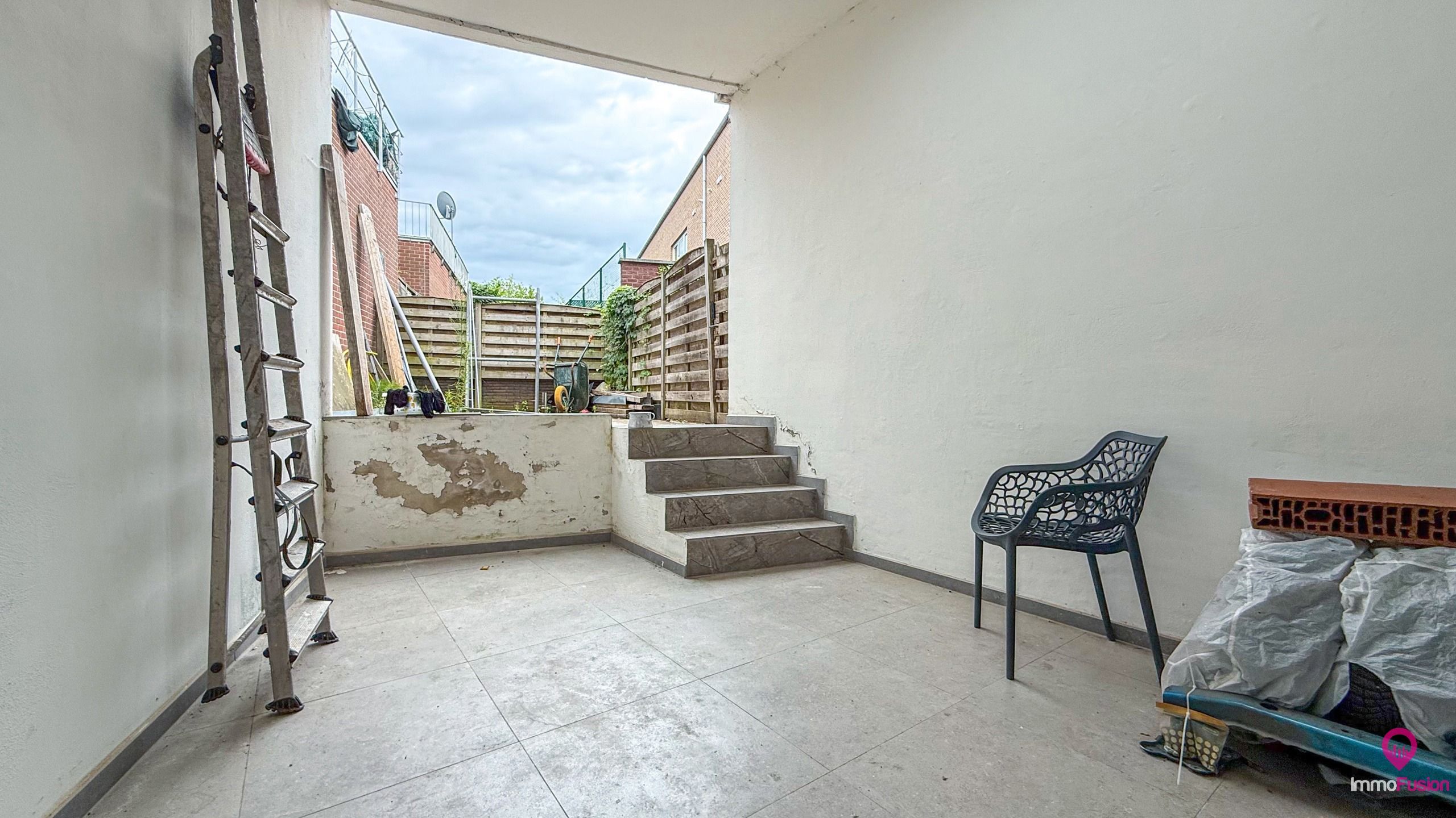 Gelijkvloers appartement met terras en kelder in hartje Zolder! foto 18