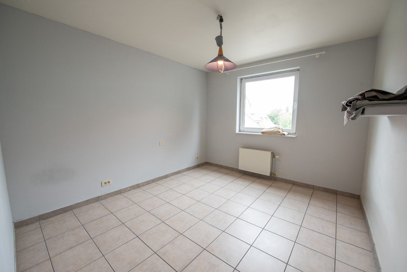 Ruim lichtrijk appartement met 2 slaapkamers en garage te Olsene. foto 16