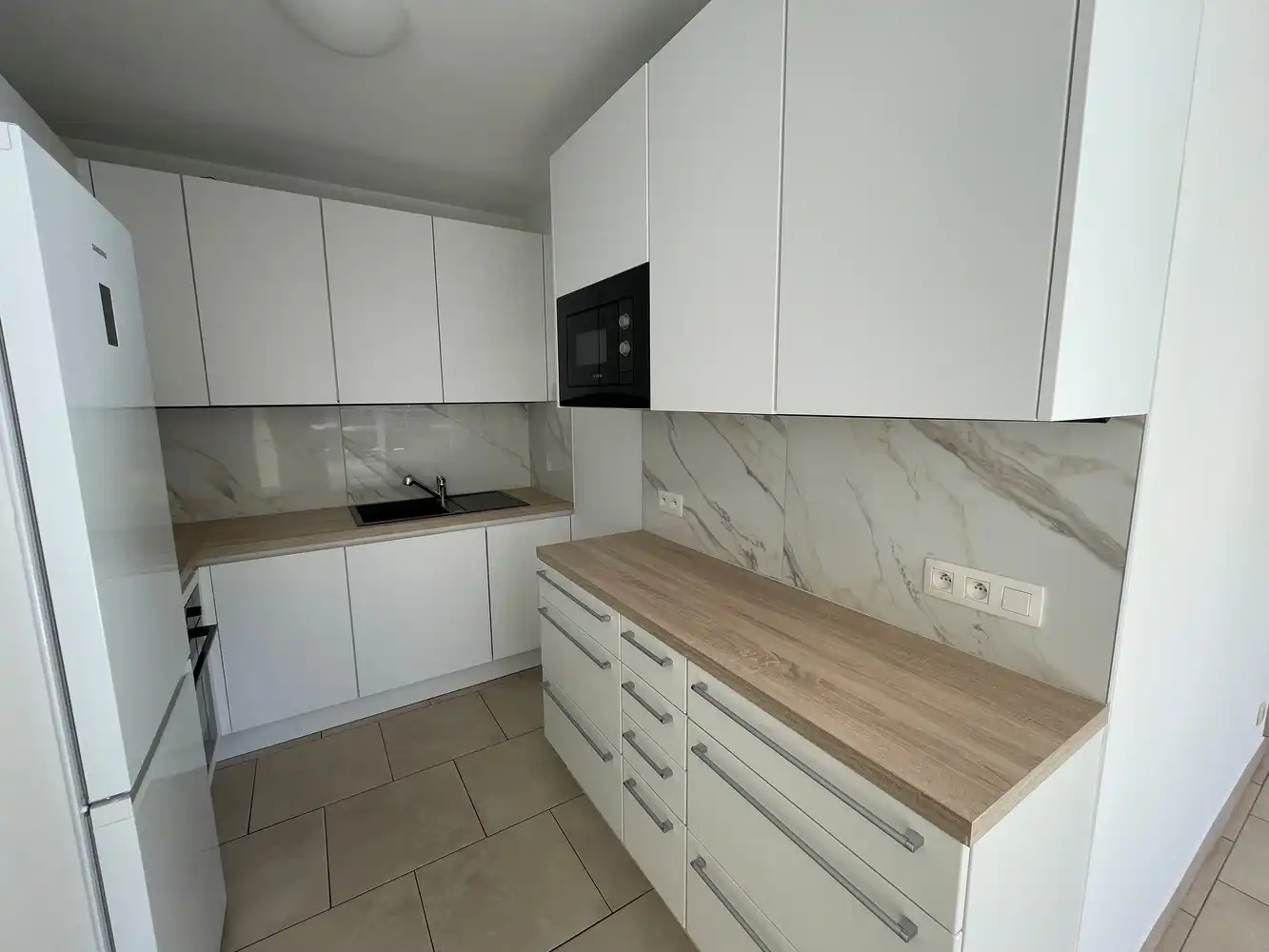 Appartement met zuidwest gericht terras van 28m² + garage foto 4