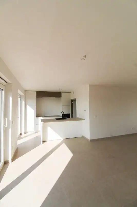 Halfopen nieuwbouwwoning met garage Roeselare foto 3