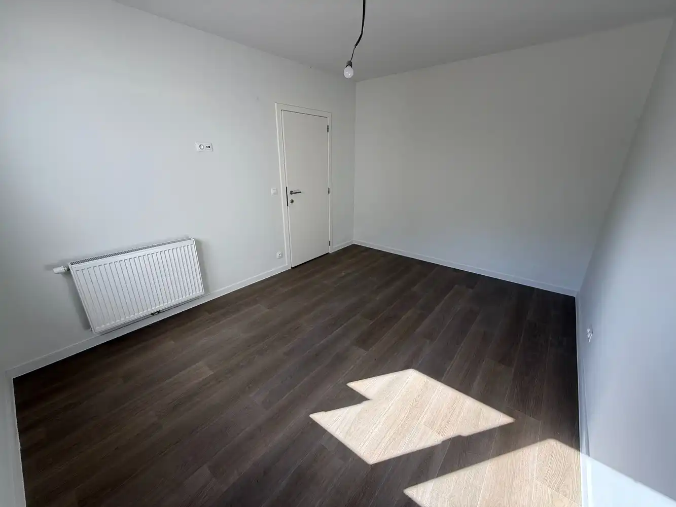 Ruim nieuwbouwappartement met 2 slaapkamers én parkeerplaats! foto 8