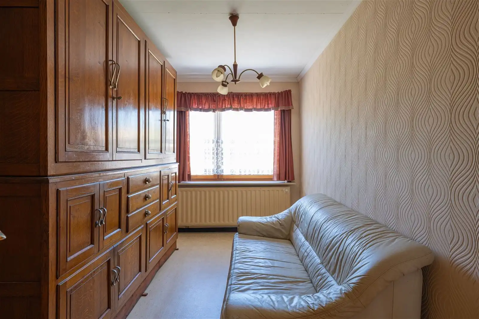Te renoveren woning mét garage foto 11