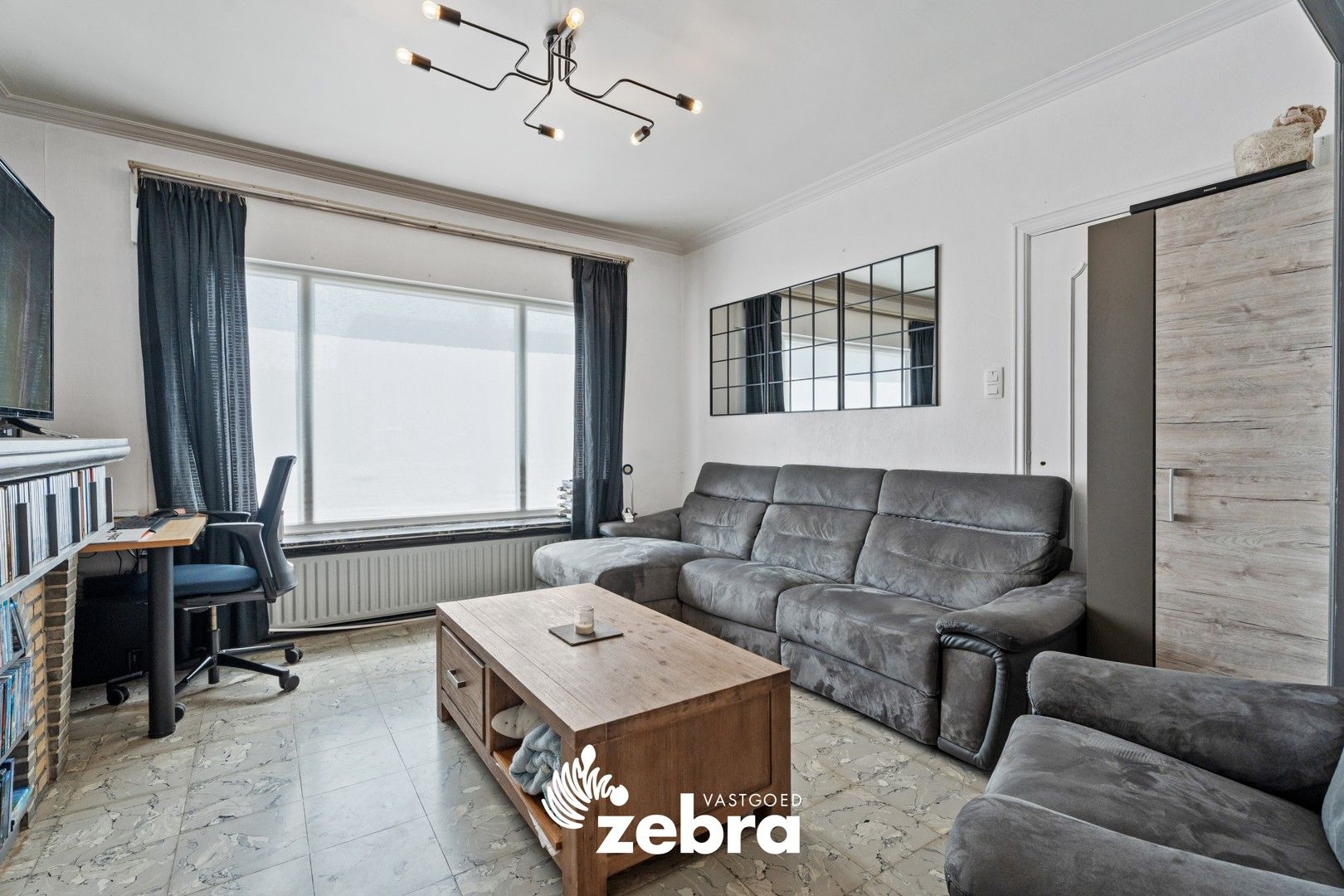 Ruime licht op te frissen woning met drie slaapkamers te Tielt! foto 6