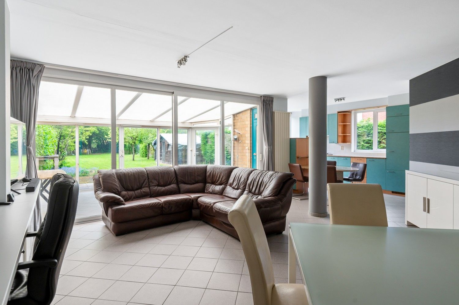 Ruime halfopen bebouwing met zuidwest georiënteerde tuin te Lint foto 2